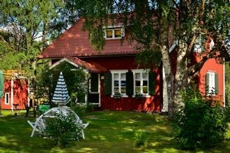 Sommartorp mitt i vildmarken med hög standard