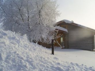 Timrad stuga i Klövsjö by