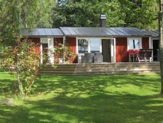 Stuga med sjötomt i vackra småland.