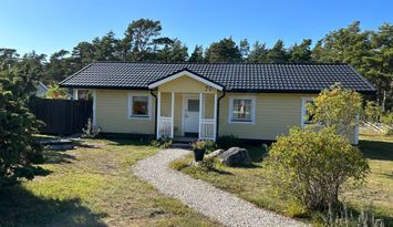 Charmigt fritidshus nära hav och bad