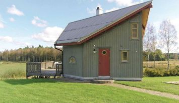 Charmig stuga med sjöutsikt
