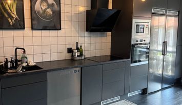 Hus nära Romme Alpin