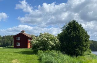 Traditional cottage at lake