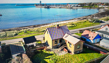 Stuga 10 meter från stranden