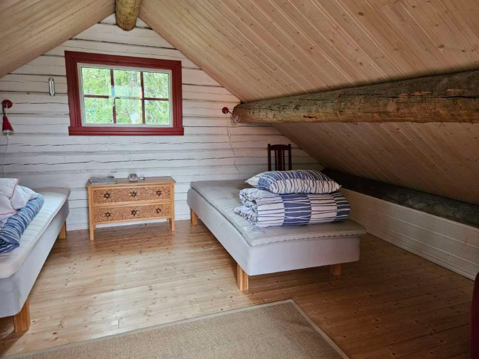 Mysig timmerstuga i Borgafjäll – bild 11 av 12