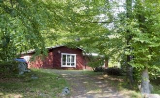 Feriehaus in dem Bochenwald neben See