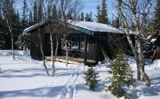 Fjällstuga med utsikt mot Storsnasen