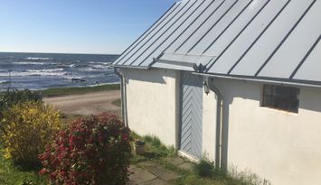 Stuga 10 meter från havet