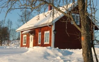 Timmerhus i Smålands trädgård