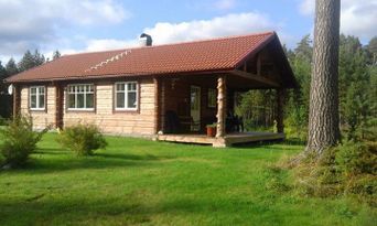 Modern timber house near lake