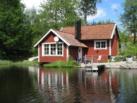 Cottage in smaland on the shore of a lake, sauna