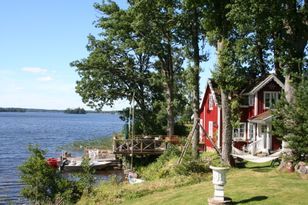 House by the Lake Sämsjön, boat fishing in Sweden