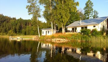 Big modern summer house by lake