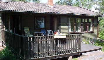 Sjönära sommarstuga med havsutsikt