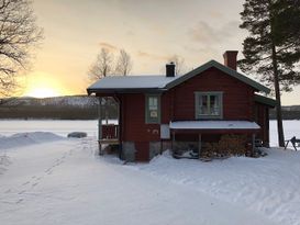 Lonely cabin by the lake