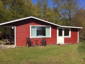 sommarstuga med panoramautsikt mot havet