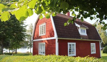 Stort hus med strandtomt
