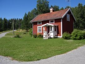 Cottage at a farmstead with the view of th lake