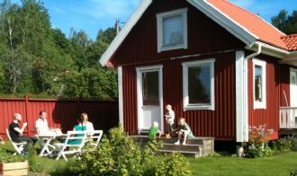 Rural, idyllic small typical Swedish red cottage