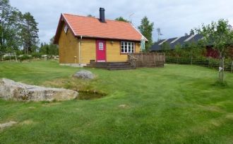 Modern timmerstuga i Småland, byggd 2010.