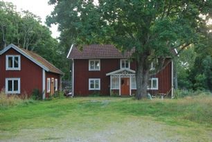 Old house on a small farm nearby the lake Åsnen