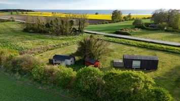 2 gemütliche Cottages mit Meerblick und Großem Ras