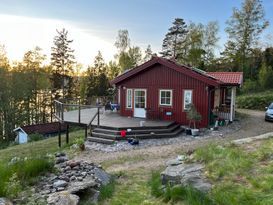 Summer cottage near the sea with a fjord view