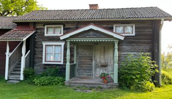 Modernt boende i timmerstuga från 1800-talet