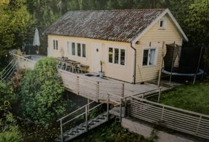 Stuga i Lindesnäs - stor altan med havsutsikt