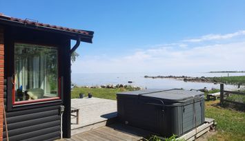 Bredaviks udde med strandtomt vid Kalmarsund