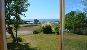 Sommarstuga med havsutsikt
