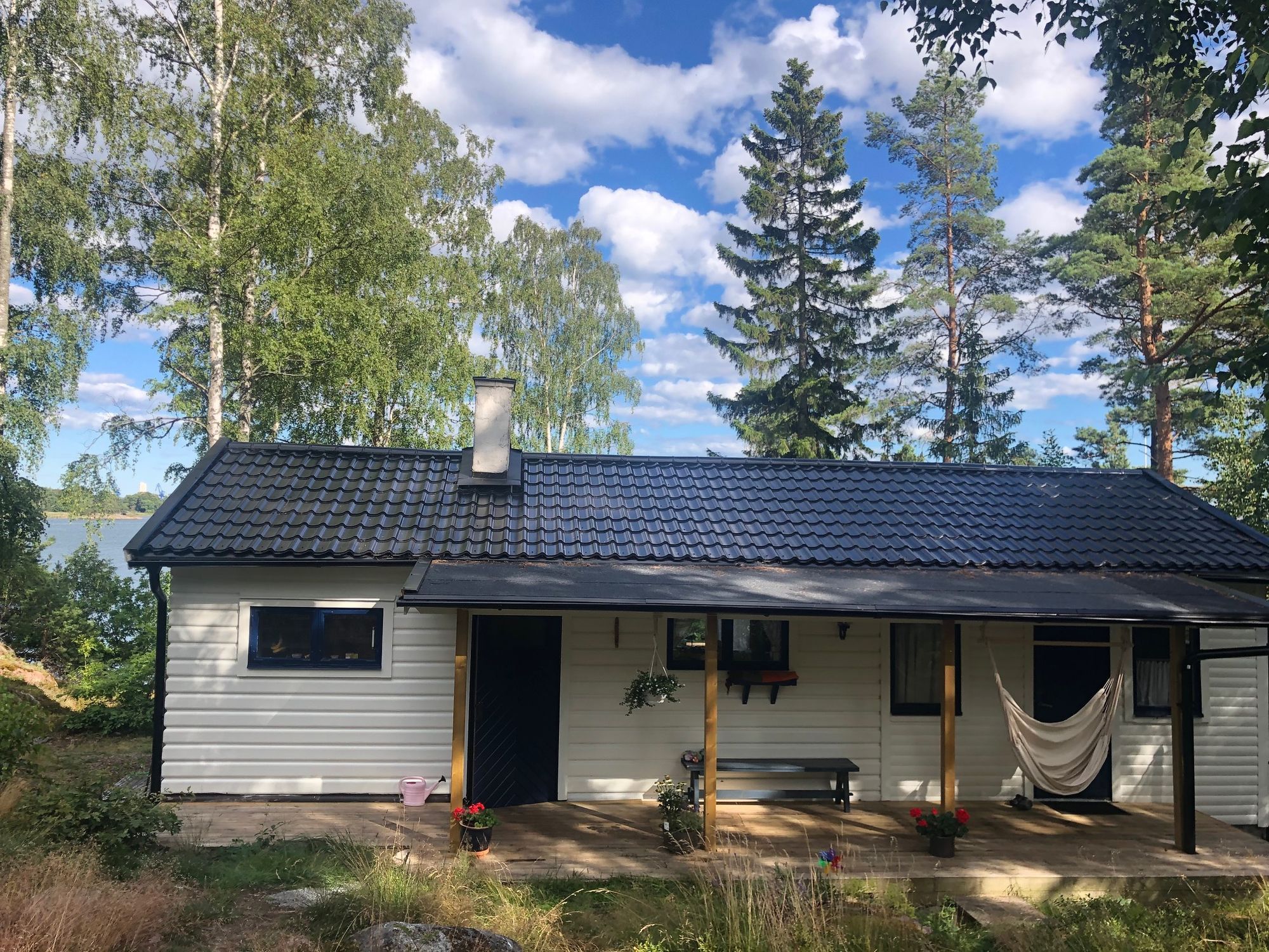 Vacker sjötomt med flera stugor och vedeldad bastu – bild 6 av 23
