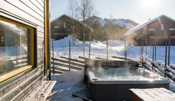 12bäddars stuga i kläppen med jacuzzi