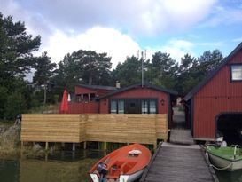 Angeln, Arkösund, Haus am See an der Lindöbucht