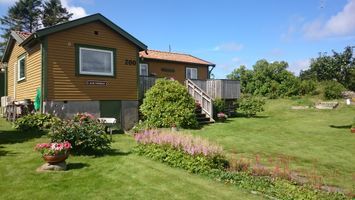 Mysig stuga vid havet