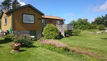 Mysig stuga vid havet