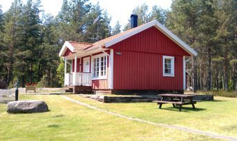 Haus mit ein Boot und Angelschein