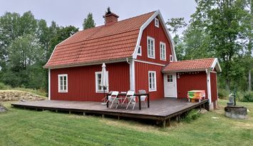 Hus ved Âsnen nationalpark.