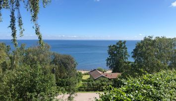 Mysig stuga med havsutsikt