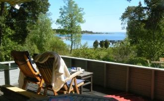 Havsutsikt, liten roddbåt med snurra, brygga!