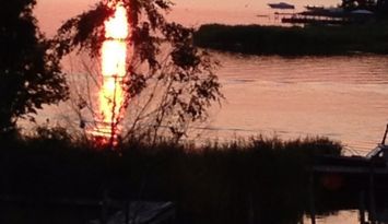 En idyllisk lägenhet med sjö utsikt.