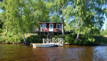 Semesterhus vid sjön Sörälgen