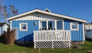 Havsnära sommarstuga i familjevänliga Grimsholmen