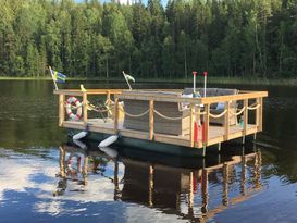 Sommarstuga vid strandkanten