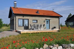 Nybyggd stuga i Näsby med havsutsikt
