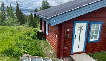 Mysig fjällstuga med utsikt i Stora Blåsjön