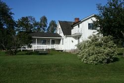 Charmigt hus nära havet