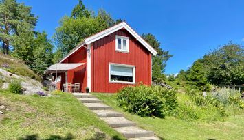 Stuga med havsutsikt