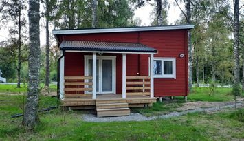 Bekvämt trähus vid skogsbrynet