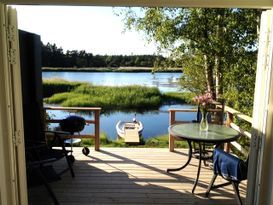 Cottage by the ocean. Private garden,pier and boat